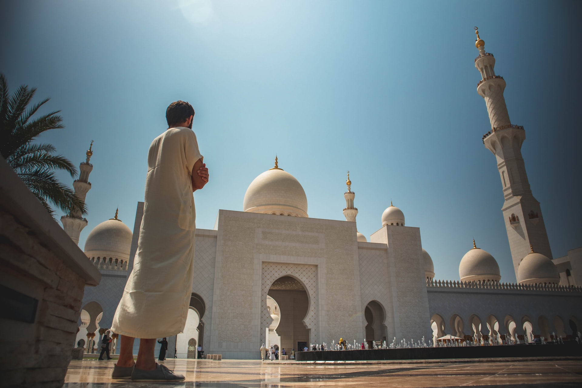 Man in Egypt looking towards a mosque